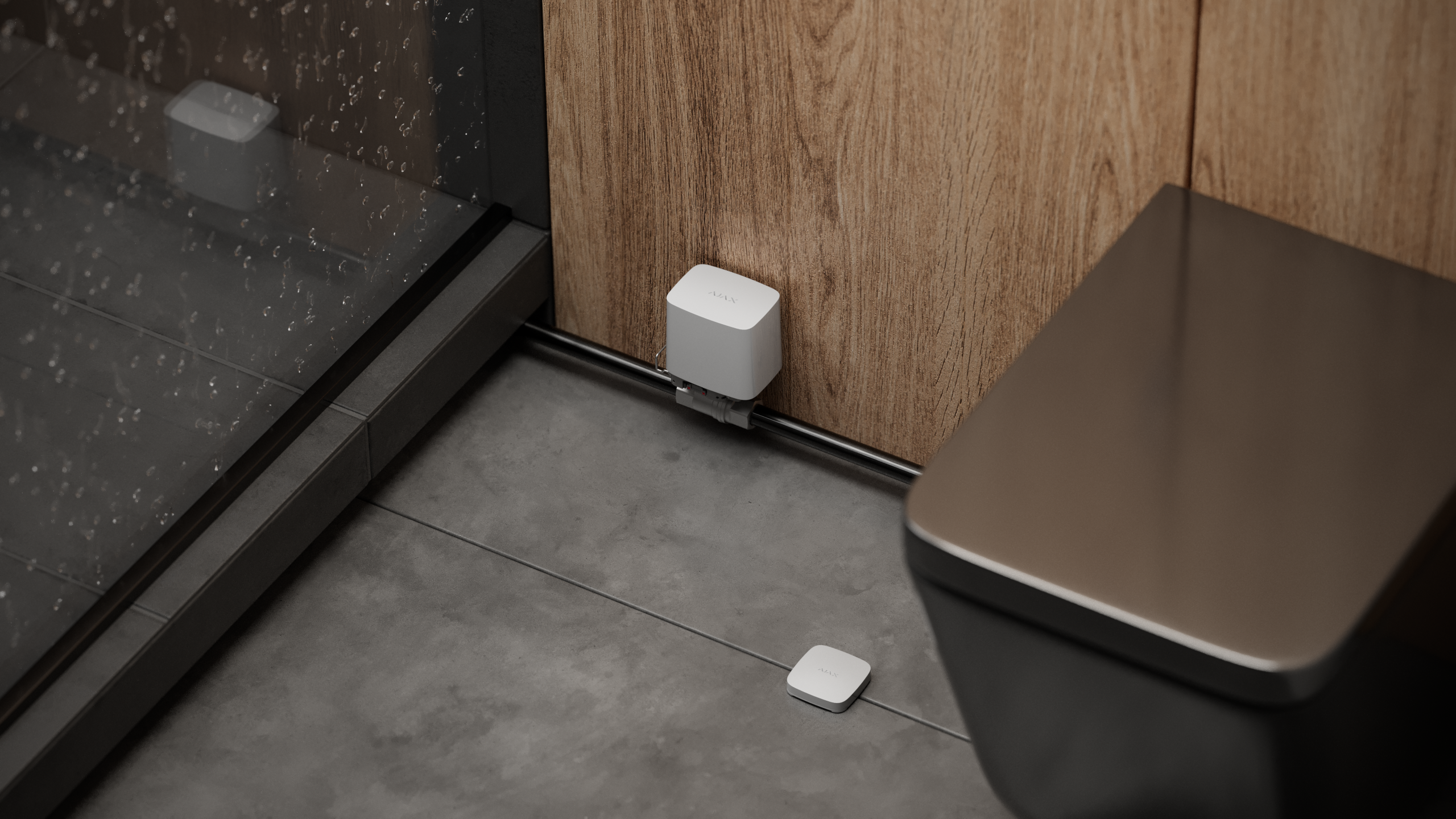 Electrovalva Wireless AJAX WaterStop 3/4” (20 DN) instalată lângă toaletă, pentru gestionarea eficientă a apei.